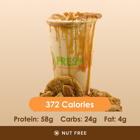 A decadent caramel cookie shake drizzled with caramel sauce, with crushed cookies and a whole cookie around its base, displaying its nutritional information.