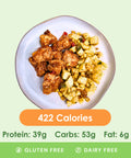 A savory smokehouse combo plate featuring tender seasoned chicken pieces and a side of flavorful diced potatoes with bell peppers.